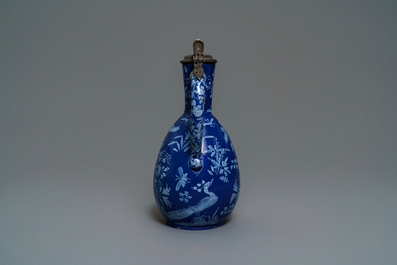 A rare Dutch Delft 'Persian blue' pewter-mounted jug, 17/18th C.